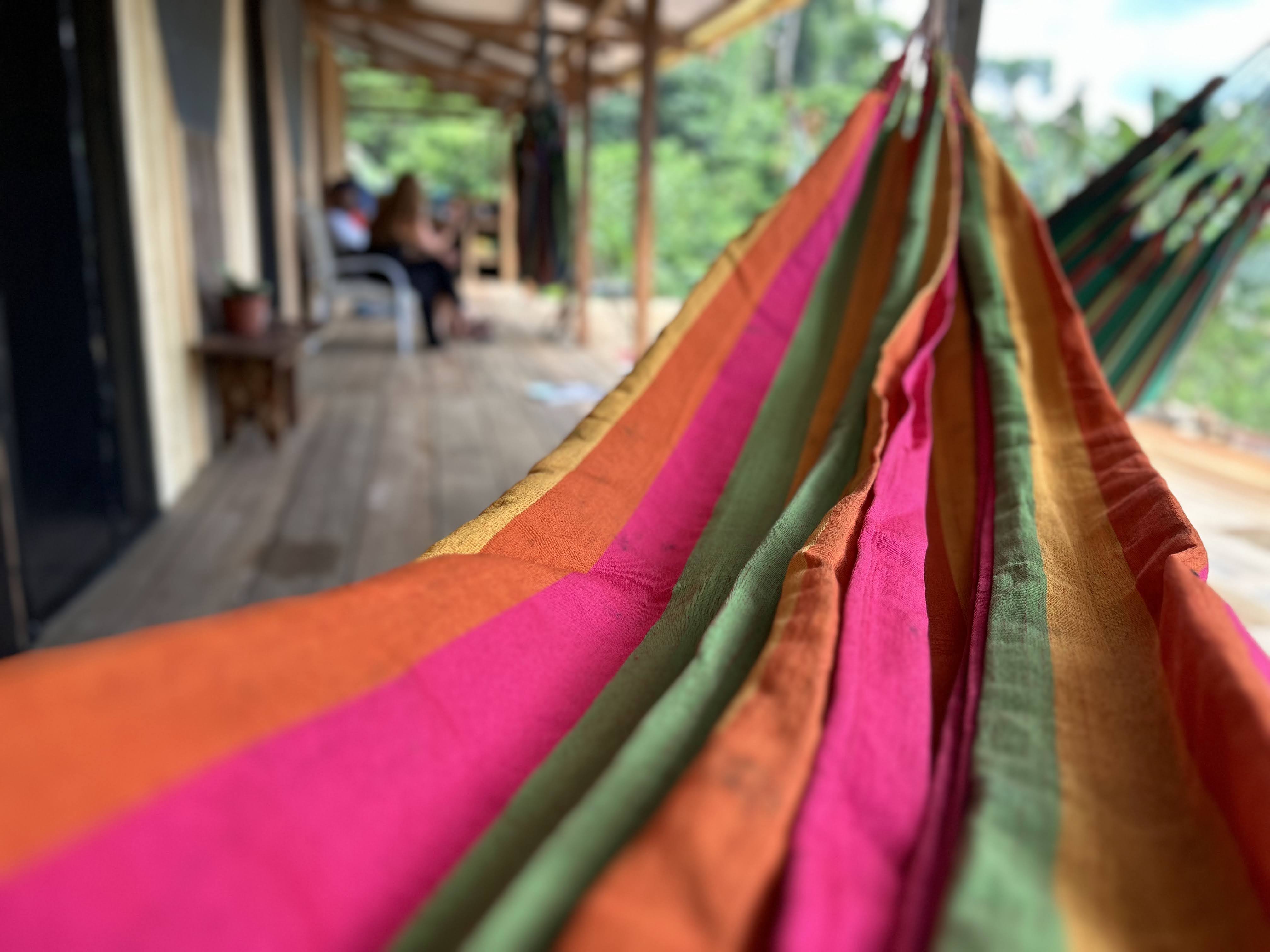 A striped hammock on the deck