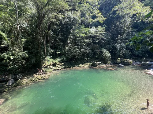 The Vides River forms a natural pool in the jungle