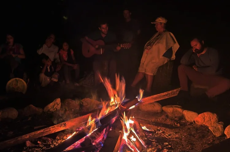 Fireside circle at night